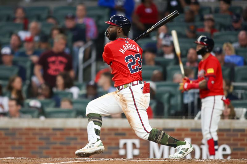 May 17, 2024; Atlanta, Georgia, USA; Atlanta Braves center fielder Michael Harris II (23) reaches on an error against the San Diego Padres in the fourth inning at Truist Park. Mandatory Credit: Brett Davis-USA TODAY Sports
