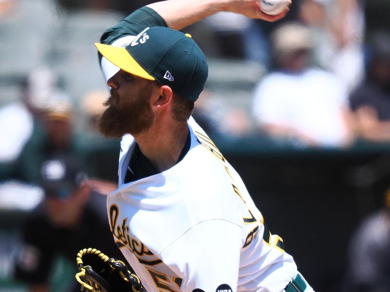 Jun 15, 2023; Oakland, California, USA; Oakland Athletics starting pitcher Paul Blackburn (58) pitches the ball against the Tampa Bay Rays during the first inning at Oakland-Alameda County Coliseum. Mandatory Credit: Kelley L Cox-USA TODAY Sports