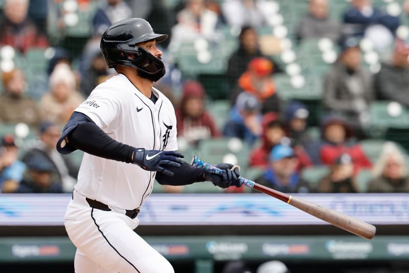 Apr 9, 2025; Detroit, Michigan, USA;  Detroit Tigers second base Colt Keith (33) hits a single in the first inning against the New York Yankees at Comerica Park. Mandatory Credit: Rick Osentoski-Imagn Images