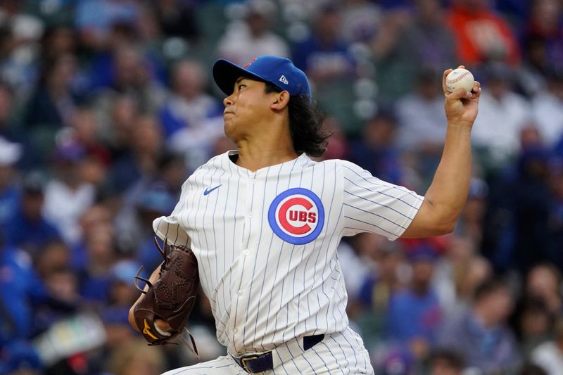Aug 6, 2024; Chicago, Illinois, USA; Chicago Cubs pitcher Shota Imanaga (18) throws the ball against the Minnesota Twins during the first inning at Wrigley Field. Mandatory Credit: David Banks-USA TODAY Sports