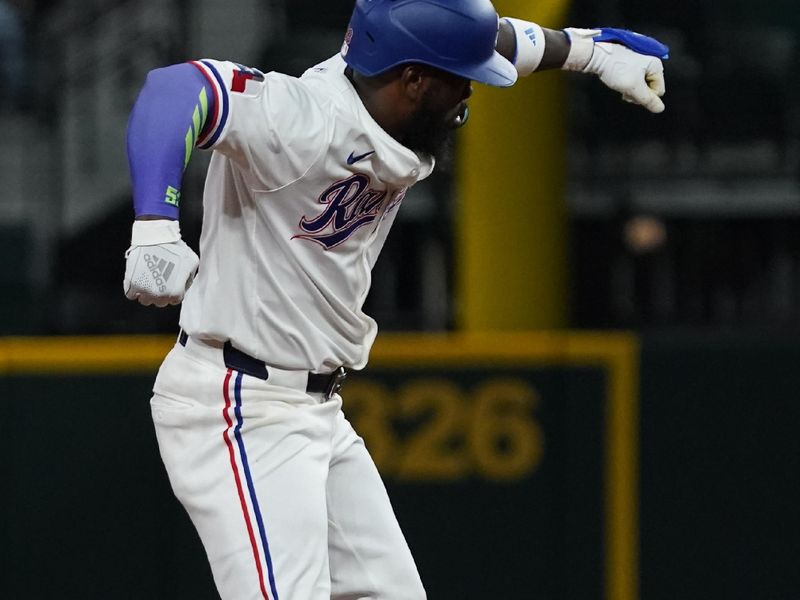May 15, 2025; Arlington, Texas, USA; Texas Rangers outfielder Adolis García (53) reacts at second base after hitting a double during the fifth inning against the Houston Astros at Globe Life Field. Mandatory Credit: Raymond Carlin III-Imagn Images
