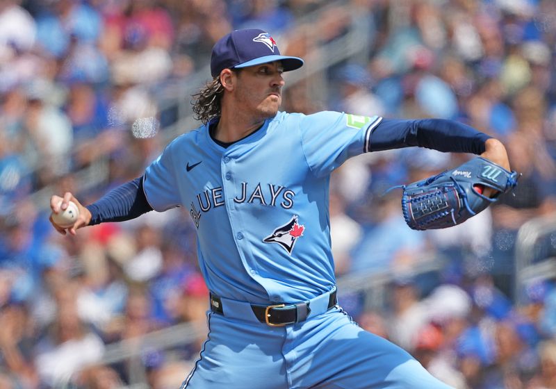 Aug 25, 2024; Toronto, Ontario, CAN; Toronto Blue Jays starting pitcher Kevin Gausman (34) throws a pitch against the Los Angeles Angels during the first inning at Rogers Centre. Mandatory Credit: Nick Turchiaro-USA TODAY Sports