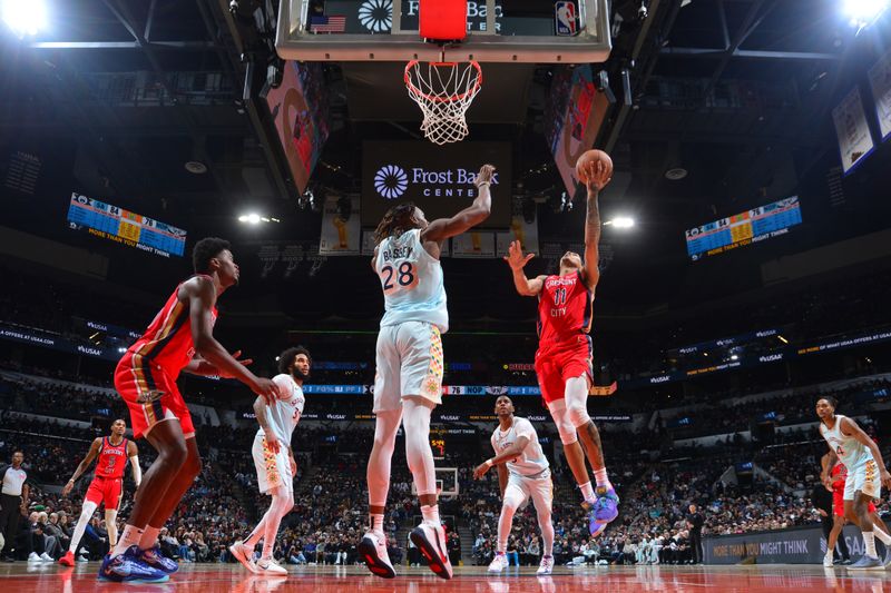 SAN ANTONIO, TX - DECEMBER 8: Brandon Boston Jr. #11 of the New Orleans Pelicans drives to the basket during the game against the San Antonio Spurs on December 8, 2024 at the Frost Bank Center in San Antonio, Texas. NOTE TO USER: User expressly acknowledges and agrees that, by downloading and or using this photograph, user is consenting to the terms and conditions of the Getty Images License Agreement. Mandatory Copyright Notice: Copyright 2024 NBAE (Photos by Michael Gonzales/NBAE via Getty Images)