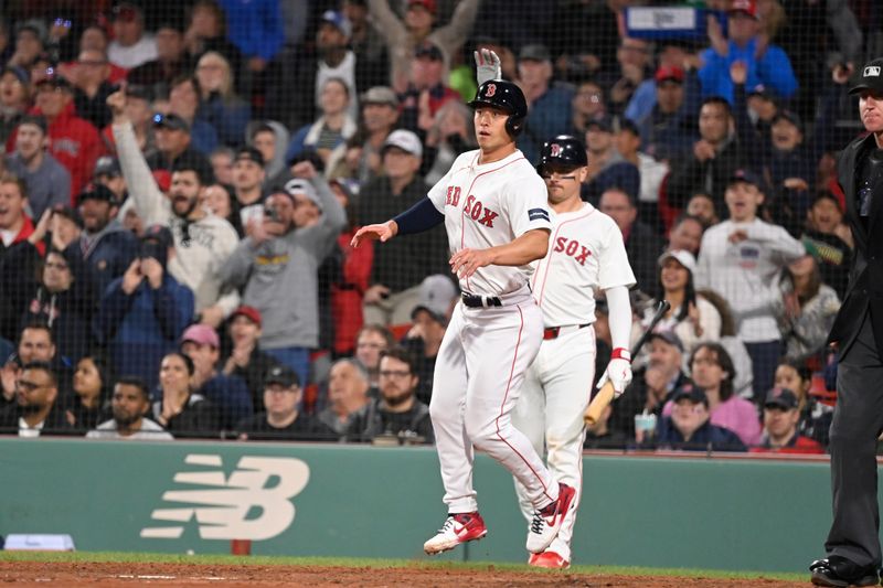 May 16, 2024; Boston, Massachusetts, USA;  Boston Red Sox left fielder Rob Refsnyder (30) scores a run against the Tampa Bay Rays  during the fifth inning at Fenway Park. Mandatory Credit: Eric Canha-USA TODAY Sports