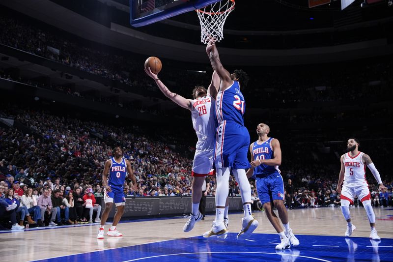 PHILADELPHIA, PA - JANUARY 15: Alperen Sengun #28 of the Houston Rockets drives to the basket during the game against the Philadelphia 76ers on January 15, 2024 at the Wells Fargo Center in Philadelphia, Pennsylvania NOTE TO USER: User expressly acknowledges and agrees that, by downloading and/or using this Photograph, user is consenting to the terms and conditions of the Getty Images License Agreement. Mandatory Copyright Notice: Copyright 2024 NBAE (Photo by Jesse D. Garrabrant/NBAE via Getty Images)