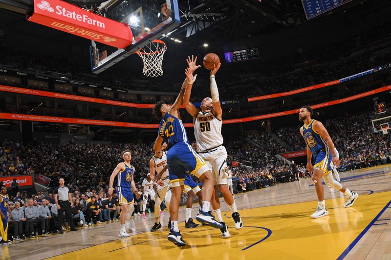 SAN FRANCISCO, CA - JANUARY 4: Aaron Gordon #50 of the Denver Nuggets drives to the basket during the game against the Golden State Warriors on January 4, 2024 at Chase Center in San Francisco, California. NOTE TO USER: User expressly acknowledges and agrees that, by downloading and or using this photograph, user is consenting to the terms and conditions of Getty Images License Agreement. Mandatory Copyright Notice: Copyright 2024 NBAE (Photo by Noah Graham/NBAE via Getty Images)