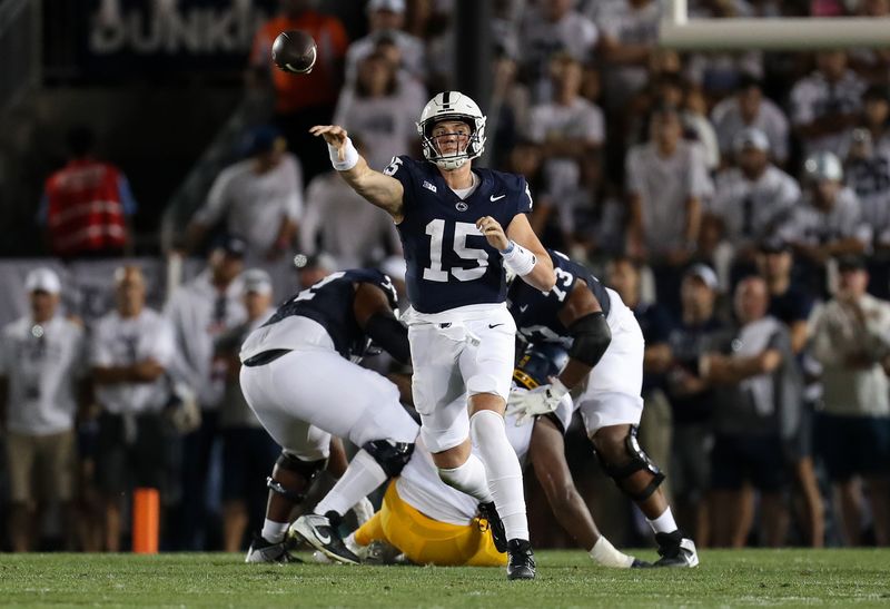 Sep 2, 2023; University Park, Pennsylvania, USA; Penn State Nittany Lions quarterback Drew Allar (15) throws a pass against the West Virginia Mountaineers during the second quarter at Beaver Stadium. Mandatory Credit: Matthew O'Haren-USA TODAY Sports