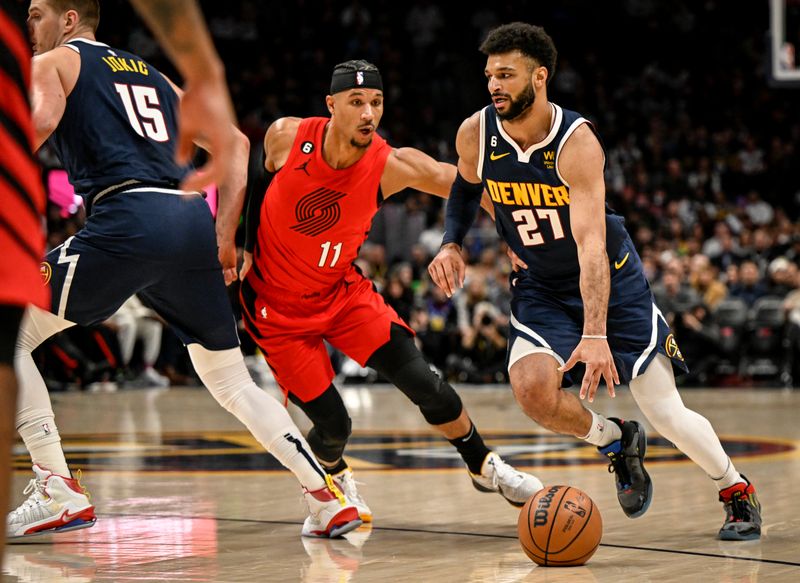 DENVER, CO - JANUARY 17: Jamal Murray (27) of the Denver Nuggets drives on Josh Hart (11) of the Portland Trail Blazers during the first quarter at Ball Arena in Denver on Tuesday, January 17, 2023. (Photo by AAron Ontiveroz/MediaNews Group/The Denver Post via Getty Images)