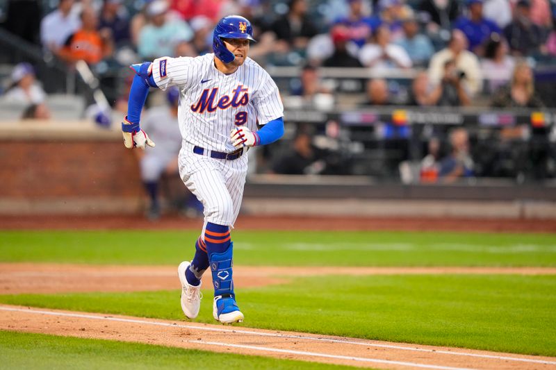 Aug 30, 2023; New York City, New York, USA;  New York Mets center fielder Brandon Nimmo (9) runs out an RBI double against the Texas Rangers during the second inning at Citi Field. Mandatory Credit: Gregory Fisher-USA TODAY Sports