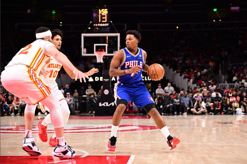 ATLANTA, GA - OCTOBER 14:  Kyle Lowry #7 of the Philadelphia 76ers dribbles the ball during the game against the Atlanta Hawks during a preseason game on October 14, 2024 at State Farm Arena in Atlanta, Georgia.  NOTE TO USER: User expressly acknowledges and agrees that, by downloading and/or using this Photograph, user is consenting to the terms and conditions of the Getty Images License Agreement. Mandatory Copyright Notice: Copyright 2024 NBAE (Photo by Adam Hagy/NBAE via Getty Images)