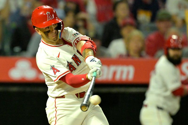 Jun 4, 2024; Anaheim, California, USA;  Los Angeles Angels shortstop Zach Neto (9) doubles in two runs in the seventh inning against the San Diego Padres at Angel Stadium. Mandatory Credit: Jayne Kamin-Oncea-USA TODAY Sports