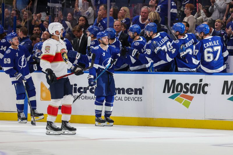 Oct 2, 2025; Tampa, Florida, USA; Tampa Bay Lightning center Brayden Point (21) celebrates after scoring a goal against the Tampa Bay Lightning in the second period at Benchmark International Arena. Mandatory Credit: Nathan Ray Seebeck-Imagn Images