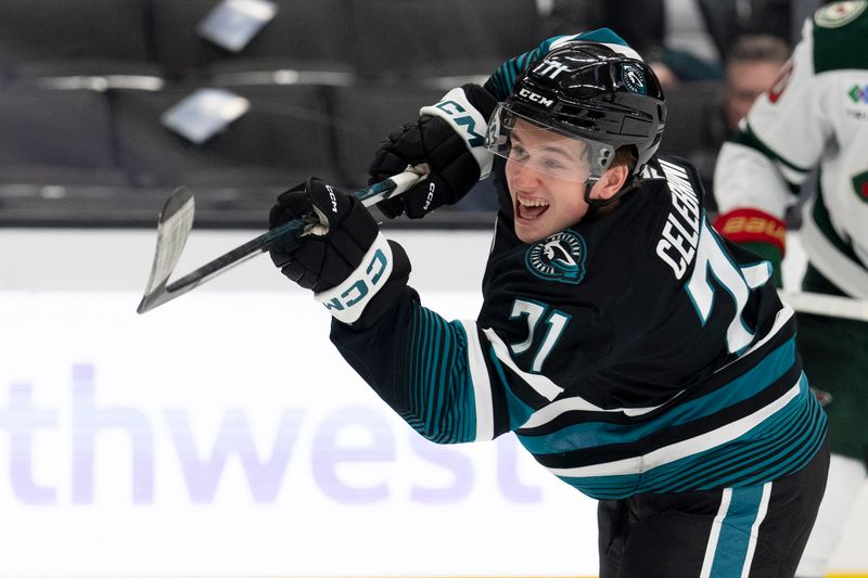 Nov 7, 2024; San Jose, California, USA;  San Jose Sharks center Macklin Celebrini (71) shoots during the second period against the Minnesota Wild at SAP Center at San Jose. Mandatory Credit: Stan Szeto-Imagn Images