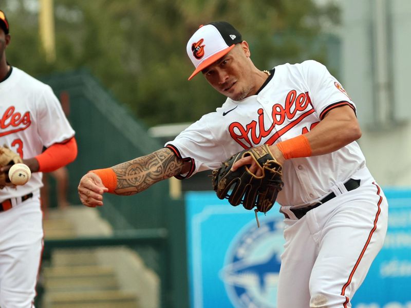 Mar 2, 2024; Sarasota, Florida, USA; Baltimore Orioles infielder Kolten Wong (16) throws the ball to first base for an out during the first inning against the New York Yankees  at Ed Smith Stadium. Mandatory Credit: Kim Klement Neitzel-USA TODAY Sports