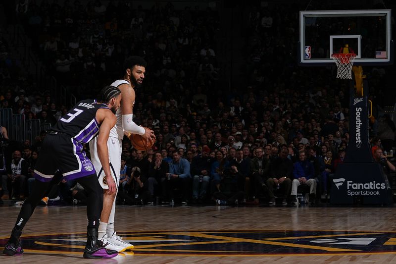 DENVER, CO - FEBRUARY 28: Jamal Murray #27 of the Denver Nuggets looks on during the game against the Sacramento Kings on February 28, 2024 at the Ball Arena in Denver, Colorado. NOTE TO USER: User expressly acknowledges and agrees that, by downloading and/or using this Photograph, user is consenting to the terms and conditions of the Getty Images License Agreement. Mandatory Copyright Notice: Copyright 2024 NBAE (Photo by Garrett Ellwood/NBAE via Getty Images)