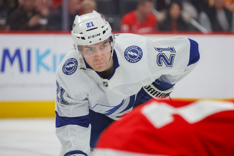 Jan 21, 2024; Detroit, Michigan, USA; Tampa Bay Lightning center Brayden Point (21) looks on before a faceoff in the first period at Little Caesars Arena. Mandatory Credit: Brian Bradshaw Sevald-USA TODAY Sports