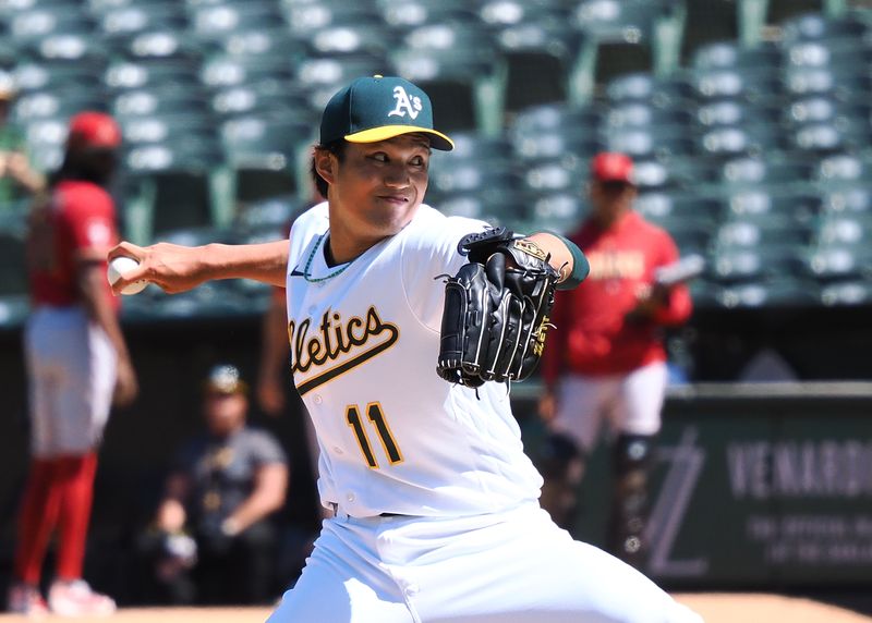 May 17, 2023; Oakland, California, USA; Oakland Athletics relief pitcher Shintaro Fujinami (11) pitches the ball against the Arizona Diamondbacks during the ninth inning at Oakland-Alameda County Coliseum. Mandatory Credit: Kelley L Cox-USA TODAY Sports