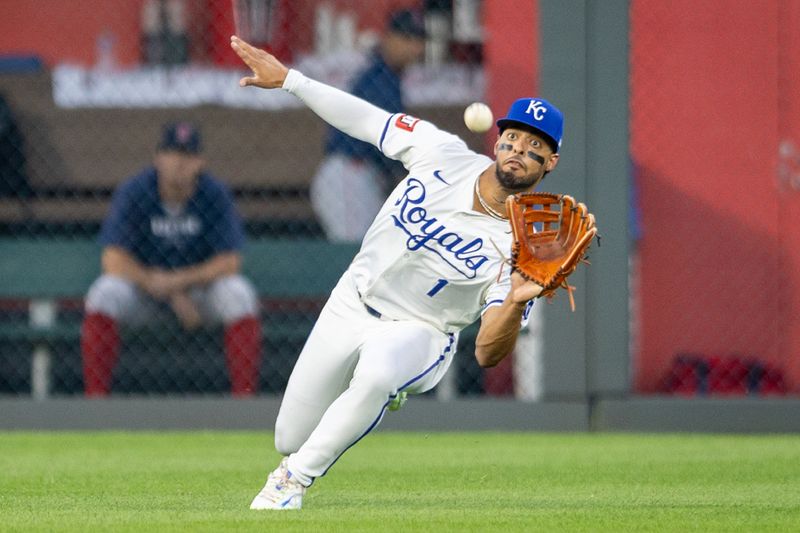 Aug 6, 2024; Kansas City, Missouri, USA; Kansas City Royals outfielder MJ Melendez (1) reaches for a fly ball during the fourth inning against the Boston Red Sox at Kauffman Stadium. Mandatory Credit: William Purnell-USA TODAY Sports