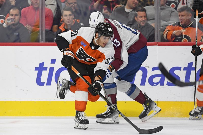 Nov 18, 2024; Philadelphia, Pennsylvania, USA; Philadelphia Flyers center Anthony Richard (90) moves past Colorado Avalanche right wing Valeri Nichushkin (13) during the first period at Wells Fargo Center. Mandatory Credit: Eric Hartline-Imagn Images