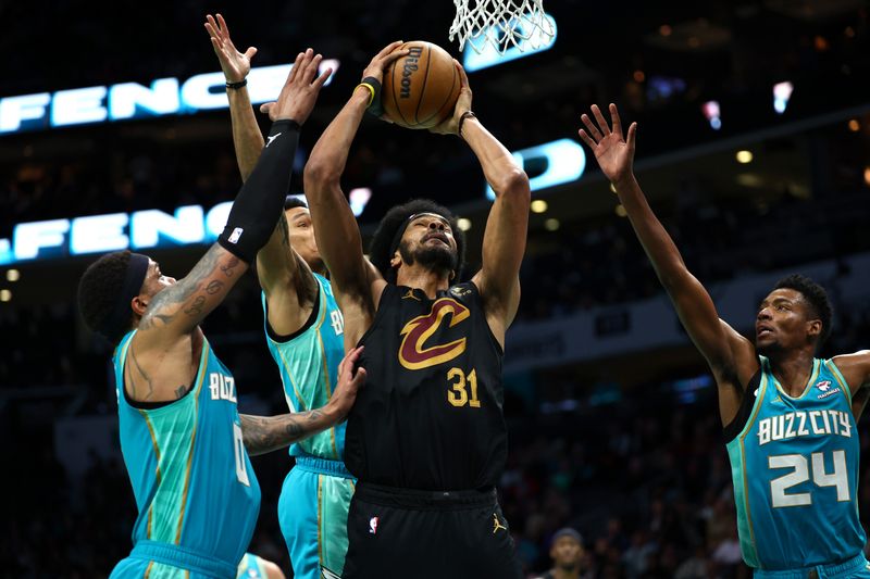 CHARLOTTE, NORTH CAROLINA - MARCH 27: Jarrett Allen #31 of the Cleveland Cavaliers attempts a shot against the Charlotte Hornets during the second half of the game at Spectrum Center on March 27, 2024 in Charlotte, North Carolina. NOTE TO USER: User expressly acknowledges and agrees that, by downloading and or using this photograph, User is consenting to the terms and conditions of the Getty Images License Agreement. (Photo by Jared C. Tilton/Getty Images)