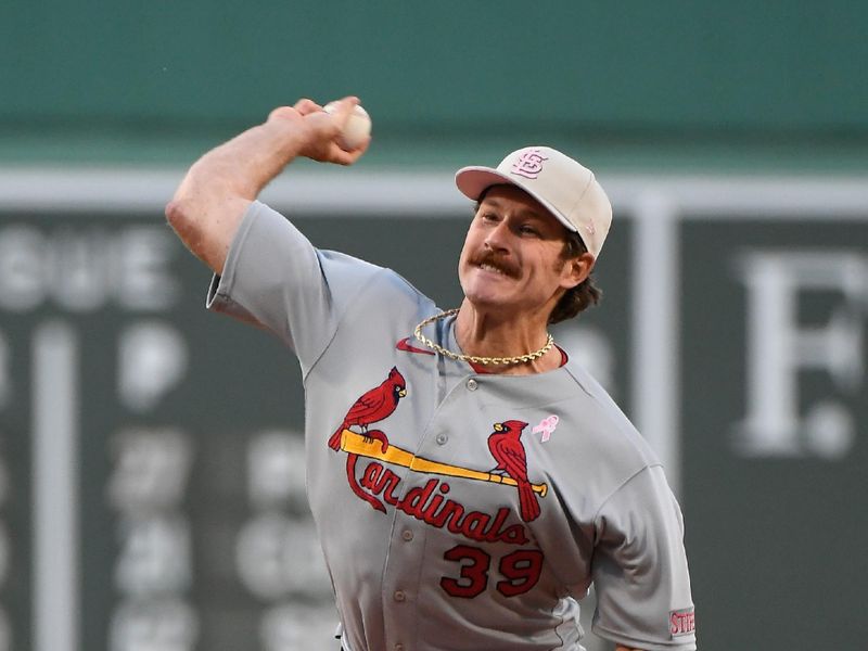 May 14, 2023; Boston, Massachusetts, USA; St. Louis Cardinals starting pitcher Miles Mikolas (39) pitches against the Boston Red Sox during the first inning at Fenway Park. Mandatory Credit: Eric Canha-USA TODAY Sports