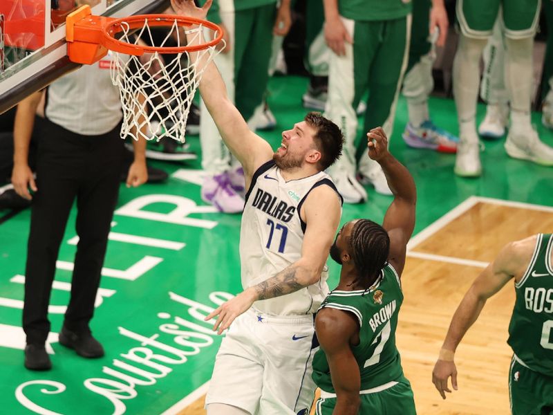 BOSTON, MA - JUNE 17: Luka Doncic #77 of the Dallas Mavericks goes to the basket during the game against the Boston Celtics during Game 5 of the 2024 NBA Finals on June 17, 2024 at the TD Garden in Boston, Massachusetts. NOTE TO USER: User expressly acknowledges and agrees that, by downloading and or using this photograph, User is consenting to the terms and conditions of the Getty Images License Agreement. Mandatory Copyright Notice: Copyright 2024 NBAE  (Photo by Stephen Gosling/NBAE via Getty Images)