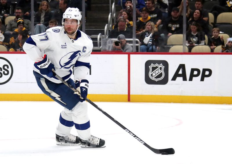 Nov 19, 2024; Pittsburgh, Pennsylvania, USA;  Tampa Bay Lightning defenseman Victor Hedman (77) skates with the puck against the Pittsburgh Penguins during the first period at PPG Paints Arena. Mandatory Credit: Charles LeClaire-Imagn Images