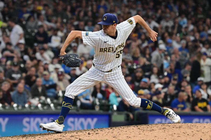 Jun 1, 2024; Milwaukee, Wisconsin, USA; Milwaukee Brewers relief pitcher Hoby Milner (55) pitches against the Chicago White Sox in the tenth inning at American Family Field. Mandatory Credit: Benny Sieu-USA TODAY Sports