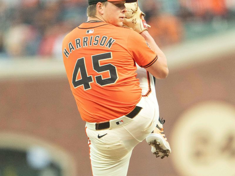 Jul 26, 2024; San Francisco, California, USA;  San Francisco Giants pitcher Kyle Harrison (45) pitches during the first inning against the Colorado Rockies at Oracle Park. Mandatory Credit: Stan Szeto-USA TODAY Sports