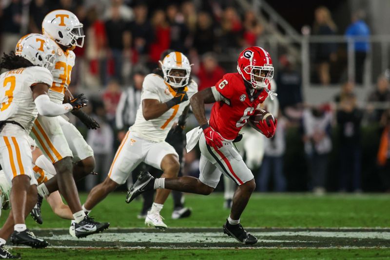 Nov 16, 2024; Athens, Georgia, USA; Georgia Bulldogs wide receiver Dominic Lovett (6) runs after a catch against the Tennessee Volunteers in the first quarter at Sanford Stadium. Mandatory Credit: Brett Davis-Imagn Images
