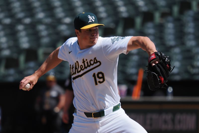 May 1, 2024; Oakland, California, USA; Oakland Athletics relief pitcher Mason Miller (19) pitches the ball against the Pittsburgh Pirates during the ninth inning at Oakland-Alameda County Coliseum. Mandatory Credit: Kelley L Cox-USA TODAY Sports