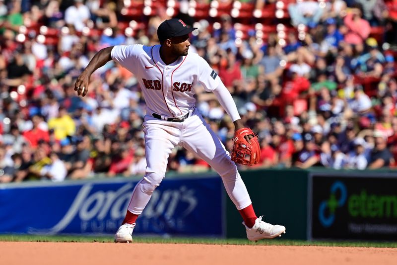 Aug 27, 2023; Boston, Massachusetts, USA; Boston Red Sox second baseman Pablo Reyes (19) makes a throw to first base during the eighth inning against the Los Angeles Dodgers at Fenway Park. Mandatory Credit: Eric Canha-USA TODAY Sports