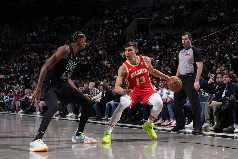 BROOKLYN, NY - FEBRUARY 29: Bogdan Bogdanovic #13 of the Atlanta Hawks dribbles the ball during the game against the Brooklyn Nets on February 29, 2024 at Barclays Center in Brooklyn, New York. NOTE TO USER: User expressly acknowledges and agrees that, by downloading and or using this Photograph, user is consenting to the terms and conditions of the Getty Images License Agreement. Mandatory Copyright Notice: Copyright 2024 NBAE (Photo by Jesse D. Garrabrant/NBAE via Getty Images)