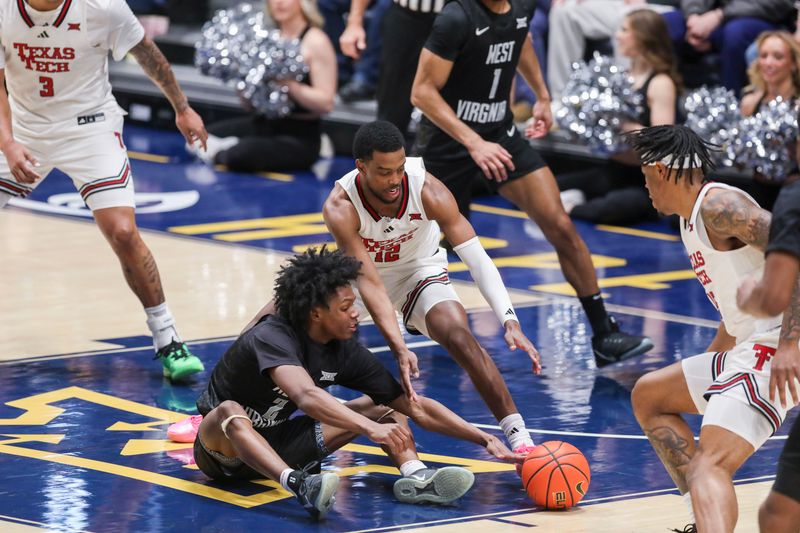 Feb 8, 2026; Morgantown, West Virginia, USA; West Virginia Mountaineers guard Amir Jenkins (2) and Texas Tech Red Raiders forward Donovan Atwell (12) dive for a loose ball during the first half at Hope Coliseum. Mandatory Credit: Ben Queen-Imagn Images