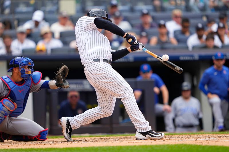 Jul 8, 2023; Bronx, New York, USA; New York Yankees first baseman Anthony Rizzo (48) hits a single against the Chicago Cubs during the third inning at Yankee Stadium. Mandatory Credit: Gregory Fisher-USA TODAY Sports