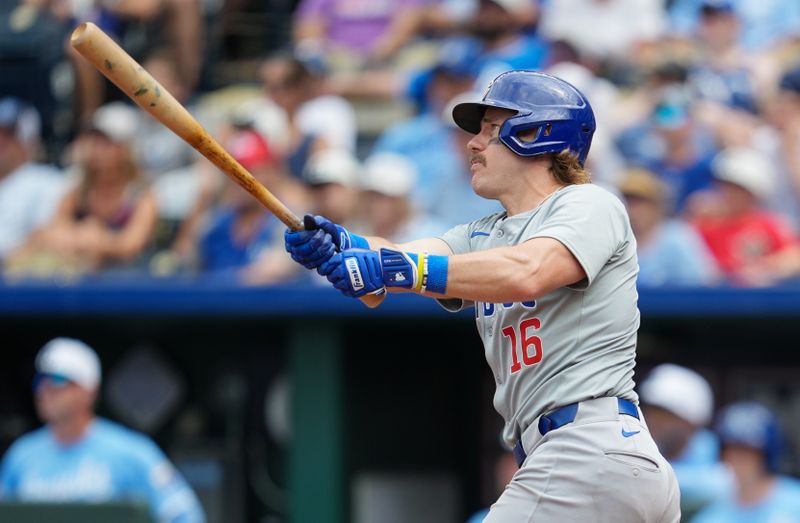 Jul 28, 2024; Kansas City, Missouri, USA; Chicago Cubs first baseman Patrick Wisdom (16) hits a home run during the ninth inning against the Kansas City Royals at Kauffman Stadium. Mandatory Credit: Jay Biggerstaff-USA TODAY Sports