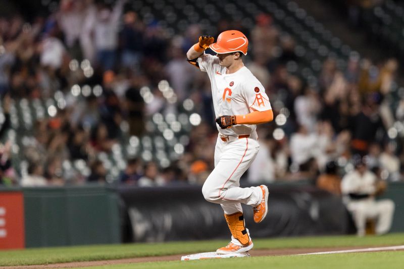 Sep 3, 2024; San Francisco, California, USA;  San Francisco Giants right fielder Mike Yastrzemski (5) gestures as he runs the bases after hitting a solo home run against the Arizona Diamondbacks during the eighth inning at Oracle Park. Mandatory Credit: John Hefti-Imagn Images