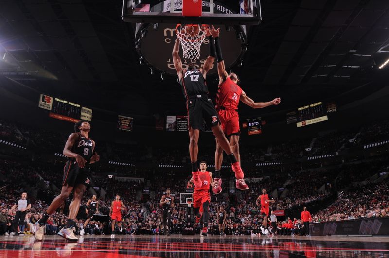 PORTLAND, OR - FEBRUARY 8: Stanley Umude #17 of the Detroit Pistons dunks the ball during the game against the Portland Trail Blazers on February 8, 2024 at the Moda Center Arena in Portland, Oregon. NOTE TO USER: User expressly acknowledges and agrees that, by downloading and or using this photograph, user is consenting to the terms and conditions of the Getty Images License Agreement. Mandatory Copyright Notice: Copyright 2024 NBAE (Photo by Cameron Browne/NBAE via Getty Images)