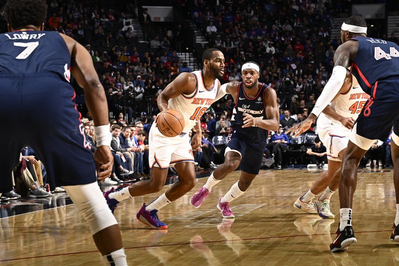 PHILADELPHIA, PA - FEBRUARY 22: Alec Burks #18 of the New York Knicks dribbles the ball during the game against the Philadelphia 76ers on February 22, 2024 at the Wells Fargo Center in Philadelphia, Pennsylvania NOTE TO USER: User expressly acknowledges and agrees that, by downloading and/or using this Photograph, user is consenting to the terms and conditions of the Getty Images License Agreement. Mandatory Copyright Notice: Copyright 2024 NBAE (Photo by David Dow/NBAE via Getty Images)