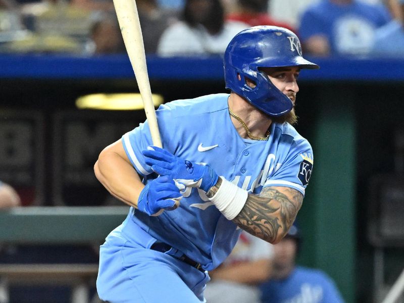 Aug 12, 2023; Kansas City, Missouri, USA;  Kansas City Royals center fielder Kyle Isbel (28) hits an RBI single in the eighth inning against the St. Louis Cardinals at Kauffman Stadium. Mandatory Credit: Peter Aiken-USA TODAY Sports