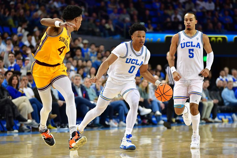 Mar 2, 2023; Los Angeles, California, USA; UCLA Bruins guard Jaylen Clark (0) moves the ball ahead of Arizona State Sun Devils guard Desmond Cambridge Jr. (4) during the second half at Pauley Pavilion. Mandatory Credit: Gary A. Vasquez-USA TODAY Sports