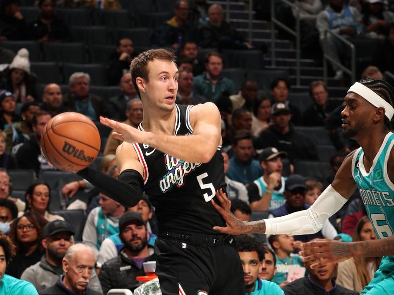 CHARLOTTE, NC - DECEMBER 5: Luke Kennard #5 of the LA Clippers handles the ball during the game against the Charlotte Hornets on December 5, 2022 at Spectrum Center in Charlotte, North Carolina. NOTE TO USER: User expressly acknowledges and agrees that, by downloading and or using this photograph, User is consenting to the terms and conditions of the Getty Images License Agreement. Mandatory Copyright Notice: Copyright 2022 NBAE (Photo by Kent Smith/NBAE via Getty Images)