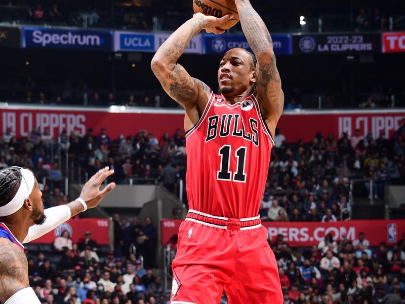 LOS ANGELES, CA - MARCH 27: DeMar DeRozan #11 of the Chicago Bulls shoots the ball during the game against the LA Clippers on March 27, 2023 at Crypto.Com Arena in Los Angeles, California. NOTE TO USER: User expressly acknowledges and agrees that, by downloading and/or using this Photograph, user is consenting to the terms and conditions of the Getty Images License Agreement. Mandatory Copyright Notice: Copyright 2023 NBAE (Photo by Adam Pantozzi/NBAE via Getty Images)