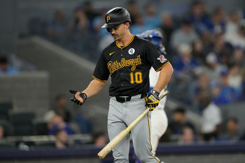 Jun 2, 2024; Toronto, Ontario, CAN; Pittsburgh Pirates left fielder Bryan Reynolds (10) reacts after striking out against the Toronto Blue Jays during the eighth inning at Rogers Centre. Mandatory Credit: John E. Sokolowski-USA TODAY Sports