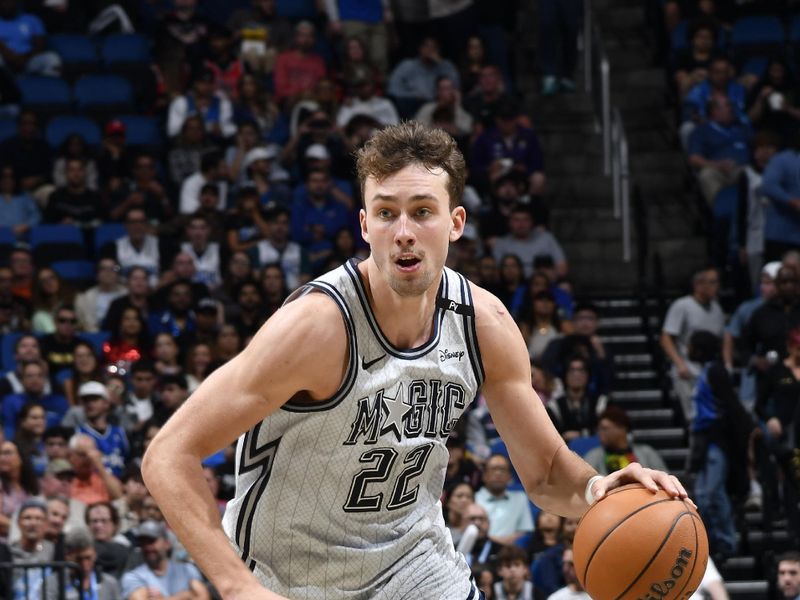 ORLANDO, FL - NOVEMBER 27: Franz Wagner #22 of the Orlando Magic handles the ball during the game against the Chicago Bulls on November 27, 2024 at Kia Center in Orlando, Florida. NOTE TO USER: User expressly acknowledges and agrees that, by downloading and or using this photograph, User is consenting to the terms and conditions of the Getty Images License Agreement. Mandatory Copyright Notice: Copyright 2024 NBAE (Photo by Fernando Medina/NBAE via Getty Images)