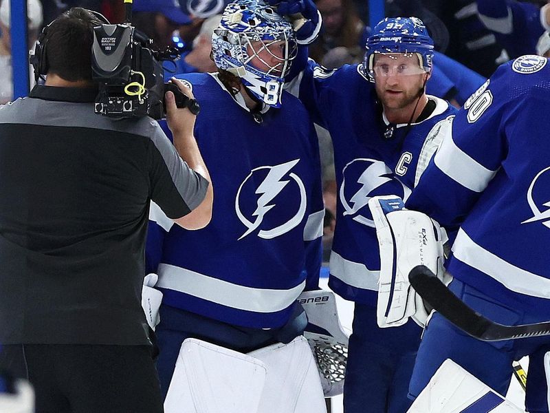 Apr 27, 2024; Tampa, Florida, USA; Tampa Bay Lightning goaltender Andrei Vasilevskiy (88) and center Steven Stamkos (91) celebrate after they beat the Florida Panthers in game four of the first round of the 2024 Stanley Cup Playoffs at Amalie Arena. Mandatory Credit: Kim Klement Neitzel-USA TODAY Sports