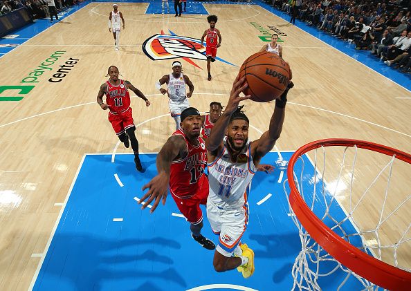 OKLAHOMA CITY, OK - NOVEMBER 22:  Isaiah Joe #11 of the Oklahoma City Thunder drives to the basket during the game against the Chicago Bulls on November 22, 2023 at Paycom Arena in Oklahoma City, Oklahoma. NOTE TO USER: User expressly acknowledges and agrees that, by downloading and or using this photograph, User is consenting to the terms and conditions of the Getty Images License Agreement. Mandatory Copyright Notice: Copyright 2023 NBAE (Photo by Zach Beeker/NBAE via Getty Images)