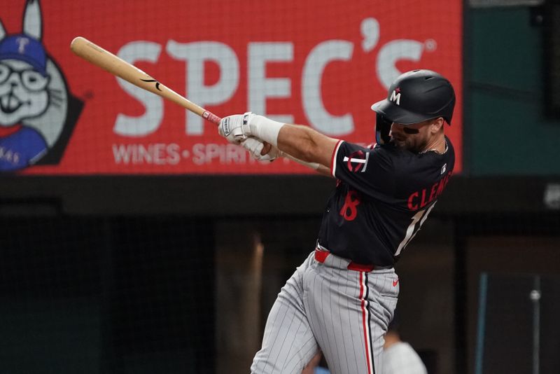 Sep 23, 2025; Arlington, Texas, USA; Minnesota Twins second baseman Kody Clemens (18) hits a double during the third inning against the Texas Rangers at Globe Life Field. Mandatory Credit: Raymond Carlin III-Imagn Images