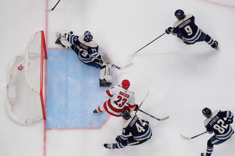 Apr 16, 2024; Columbus, Ohio, USA; Columbus Blue Jackets goalie Jet Greaves (73) makes a pad save against the Carolina Hurricanes during the third period at Nationwide Arena. Mandatory Credit: Russell LaBounty-USA TODAY Sports