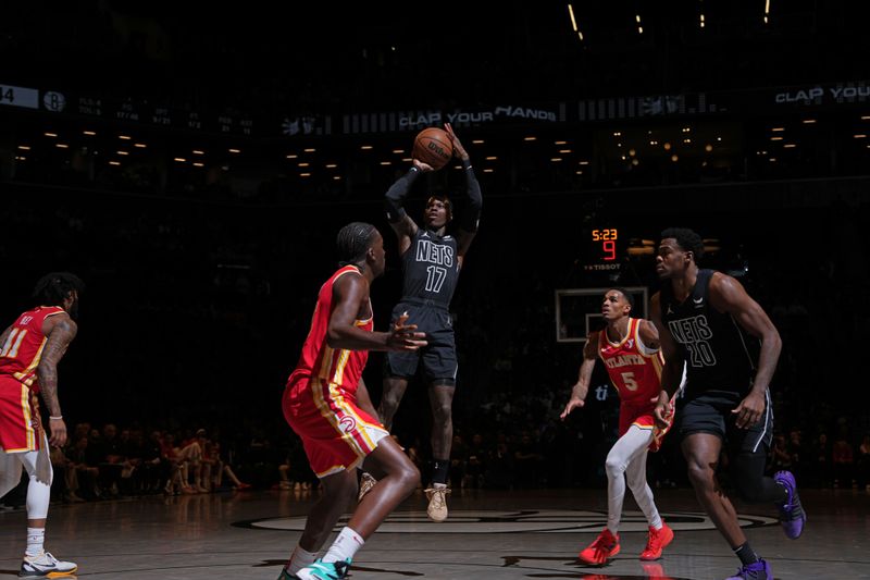 BROOKLYN, NY - FEBRUARY 29: Dennis Schroder #17 of the Brooklyn Nets shoots the ball during the game against the Atlanta Hawks on February 29, 2024 at Barclays Center in Brooklyn, New York. NOTE TO USER: User expressly acknowledges and agrees that, by downloading and or using this Photograph, user is consenting to the terms and conditions of the Getty Images License Agreement. Mandatory Copyright Notice: Copyright 2024 NBAE (Photo by Jesse D. Garrabrant/NBAE via Getty Images)